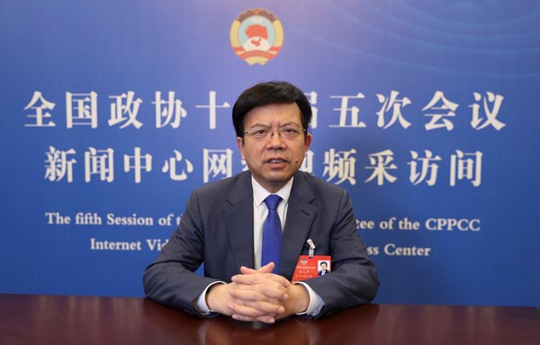 全国政协委员张义光：关爱农民工 切实保护合法权益